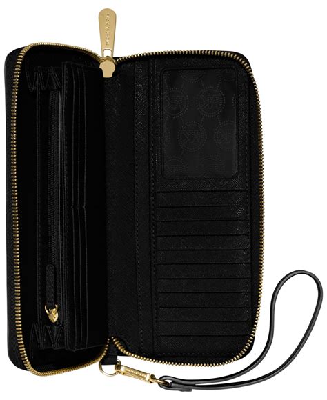 michael kors jet set zip around continental black wallet|michael kors continental wristlet wallet.